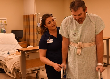 Physical Therapist student (left) during a medical simulation.