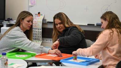 Ealry childhood students experimenting with playdoh