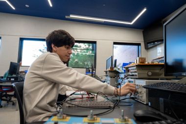 male student working in electrical technology room