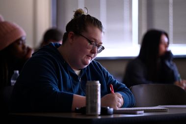 An English student taking notes. 